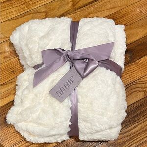 Jennifer Lopez Cream Throw with Purple Ribbon